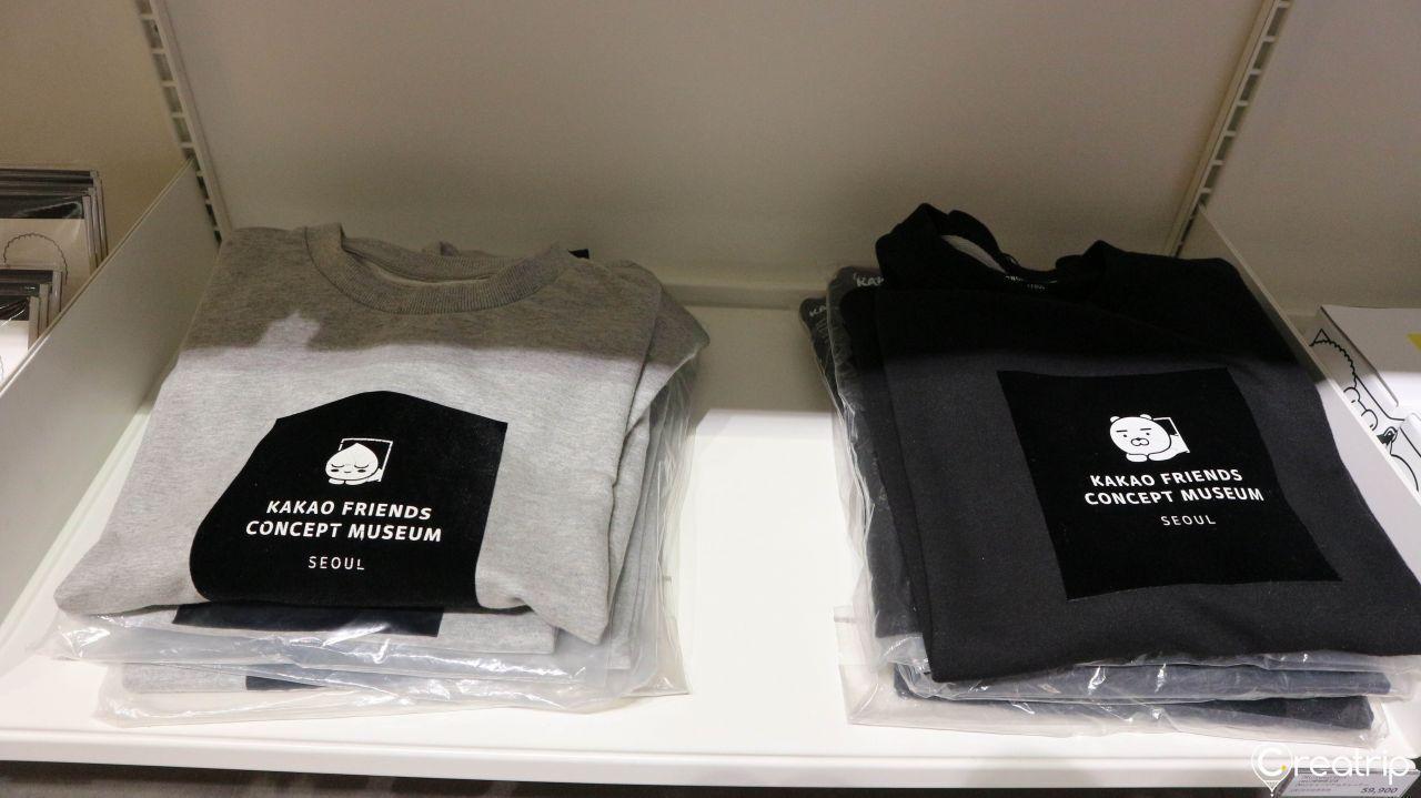 Selection of unique Kakao Friends themed apparel available for purchase at the museum shop.