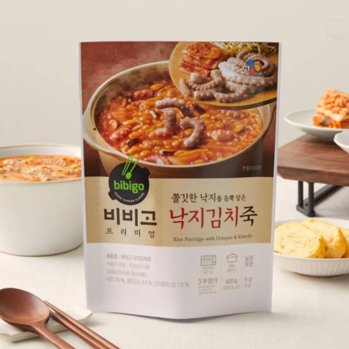 Bibigo โจ๊กสำเร็จรูปรสปลาหมึกและกิมจิ ขนาด 420 กรัม สัมผัสการอร่อยเป็นของว่างเกาหลี