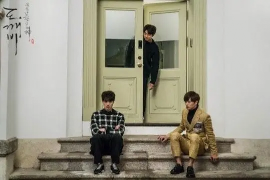 Scene from Goblin with characters in front of double doors at Yunhyeongung Western House.