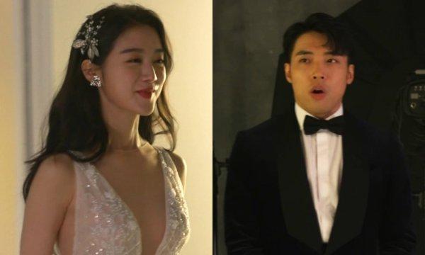 ウ・ヘリムとシン・ミンチョルがスタジオでウェディングフォト撮影中、ウ・ヘリムは飾りの付いた美しいドレスを着ている。