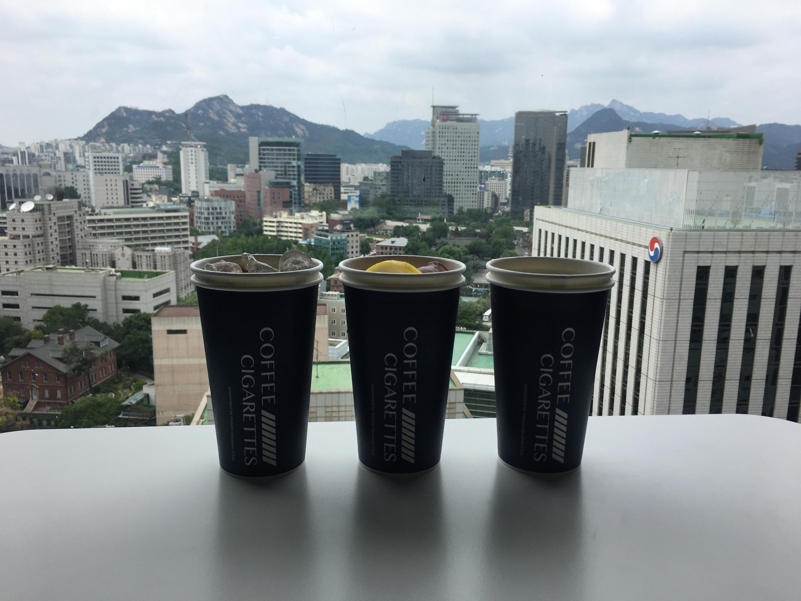 Take In The Stunning View Of The Mountains And The City At This High-Storey Cafe | Coffee And Cigarette | Seoul City Hall