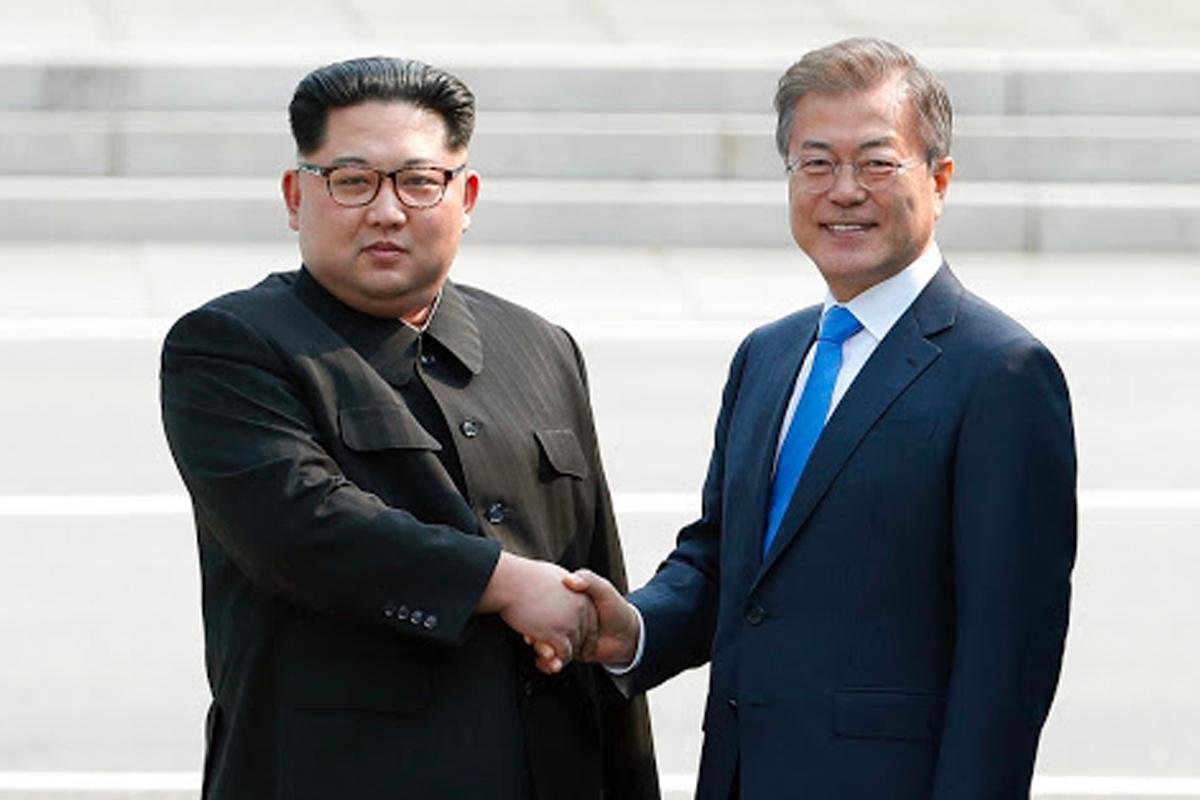 韓國與北韓領導人握手，象徵雙方為改善關係所做的努力和歷史性的會面。圖源：한국농정신문
