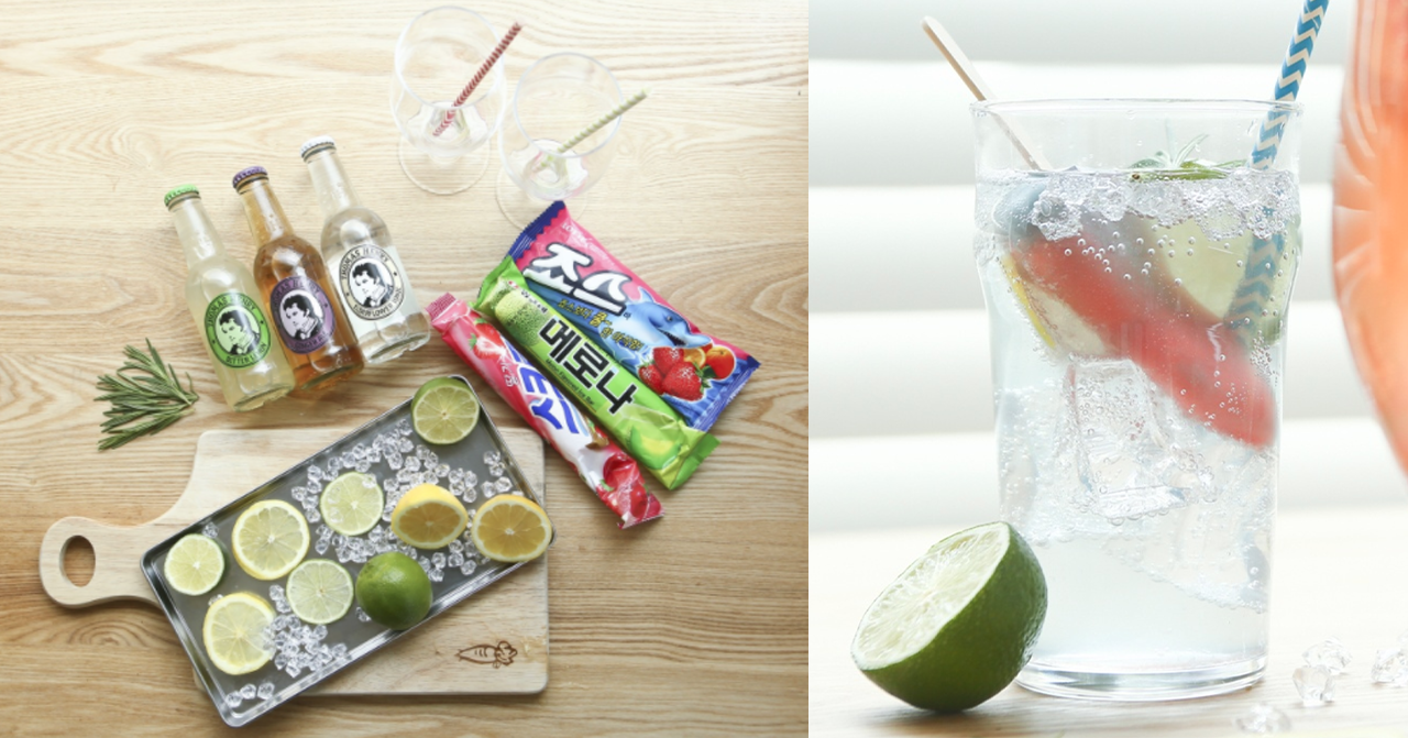 調酒用材料，包含三支玻璃瓶裝飲料、桌上的檸檬片和冰塊。