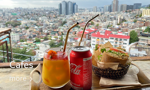 Refreshing Drinks and a Sandwich with a Stunning Overlook of Seoul Cityscape from a Cafe near Seoul Station.
