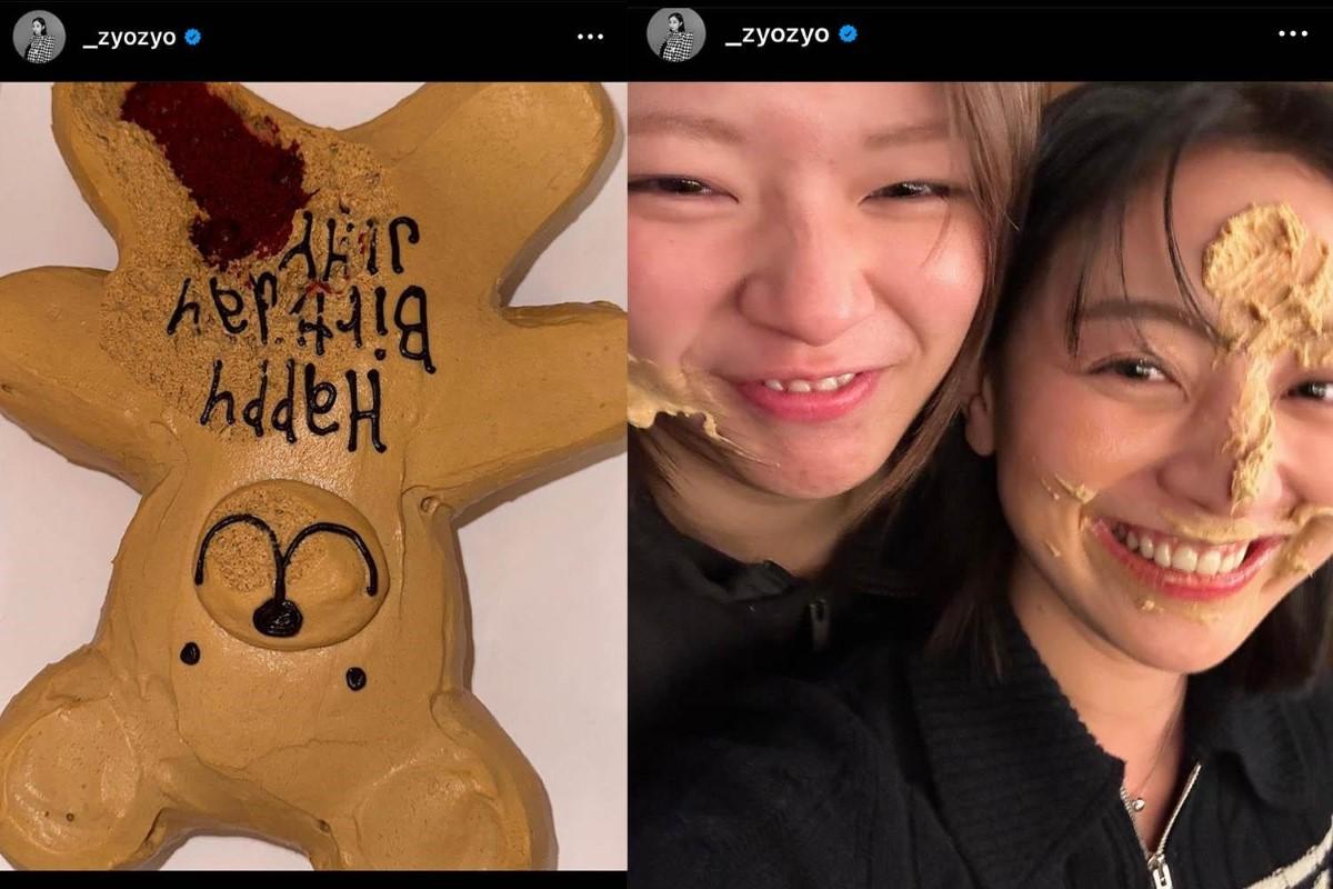 茶色の熊の形をしたケーキがあり、文字で『happy birthday juhy』と書かれている。背景にはインスタグラムの投稿が表示されている。