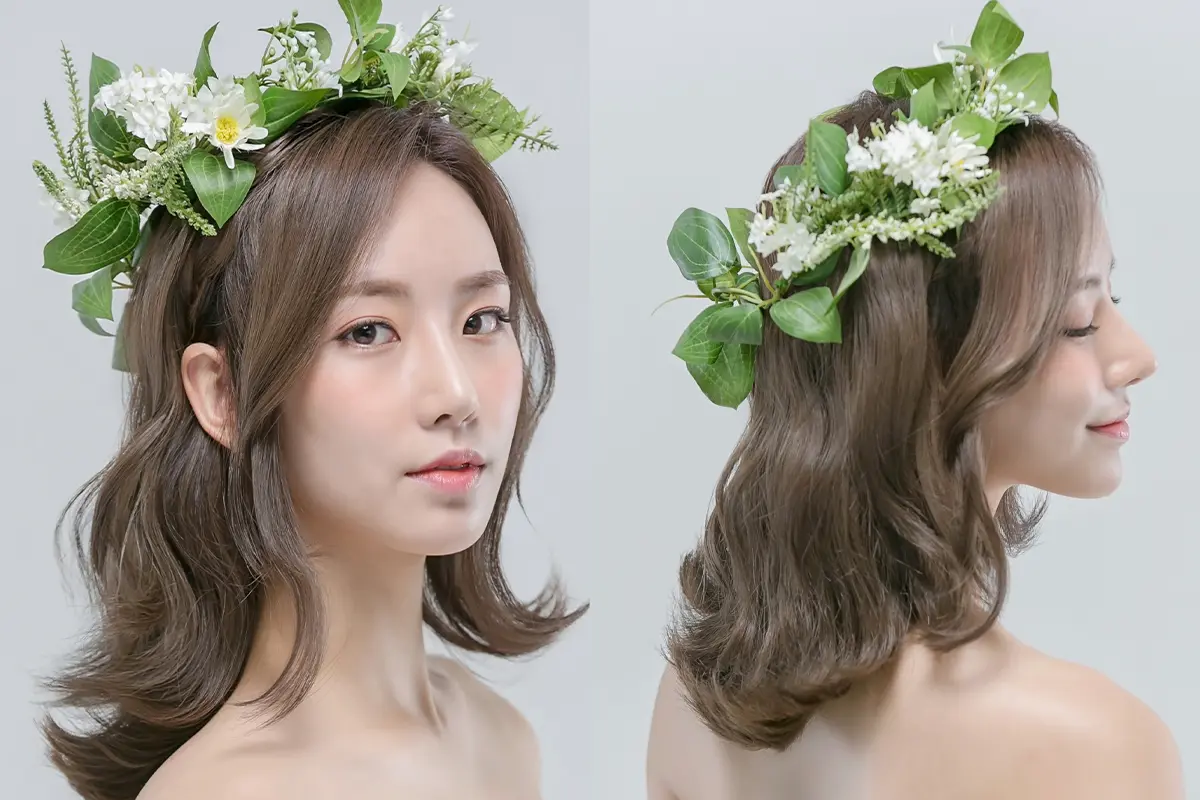 HAUT BEAUTE髮型範例,展示綠色花環裝飾的浪漫髮型。