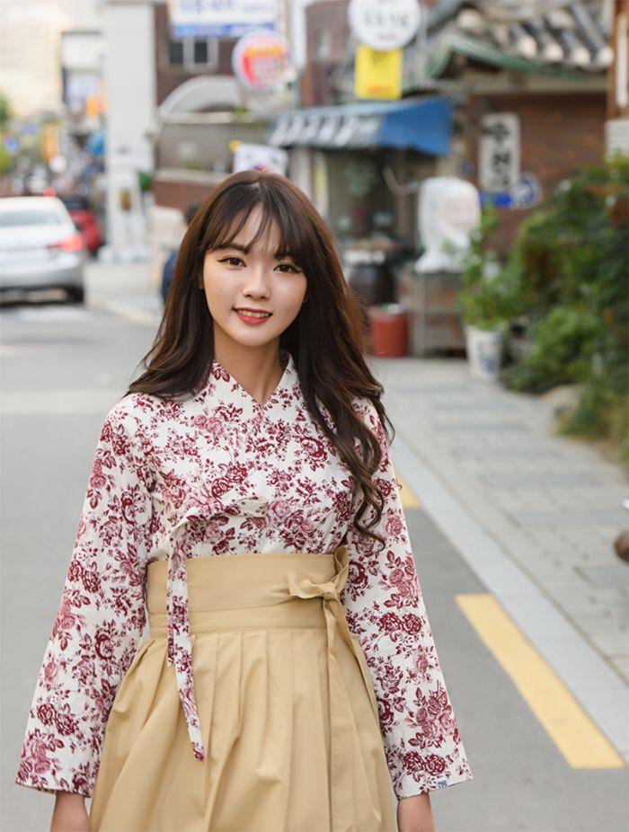 Boutique interior showcasing a range of colorful hanbok garments and accessories