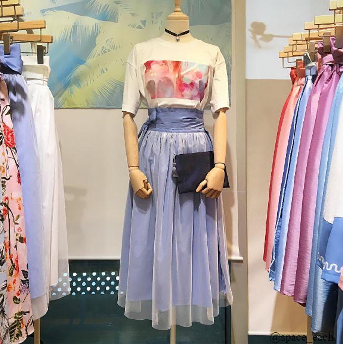 Store interior showcasing a variety of modern hanbok designs and fashion items
