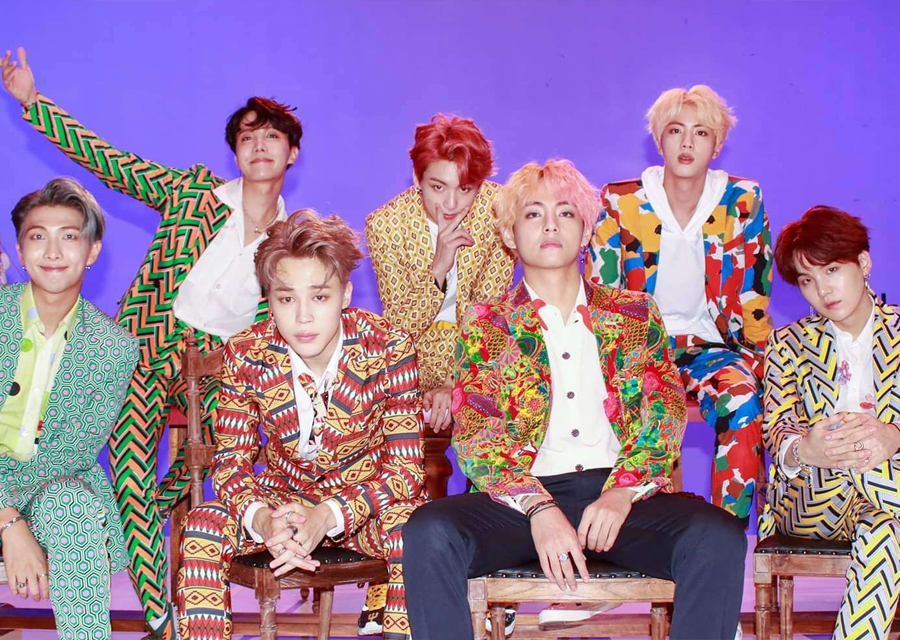 photo of kpop group BTS in clothes for idol music video