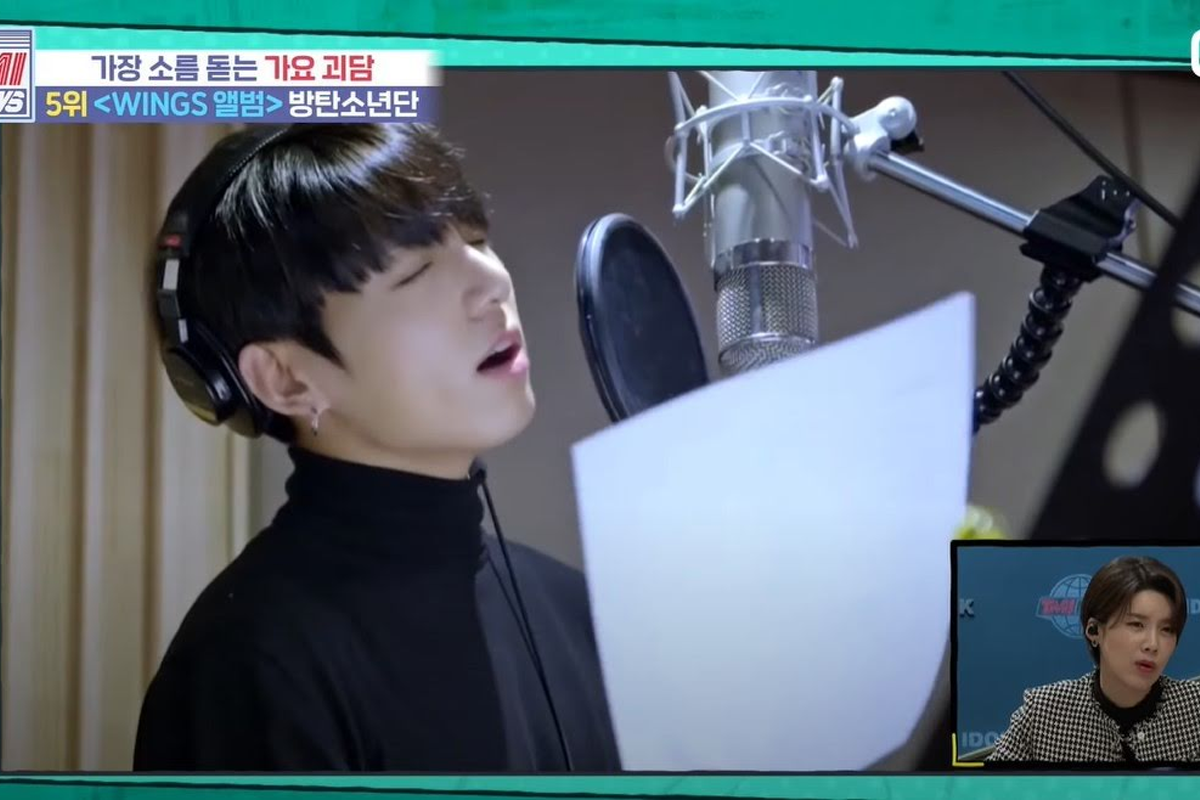 正在錄音的防彈少年團工作場景，其中一個成員與麥克風。