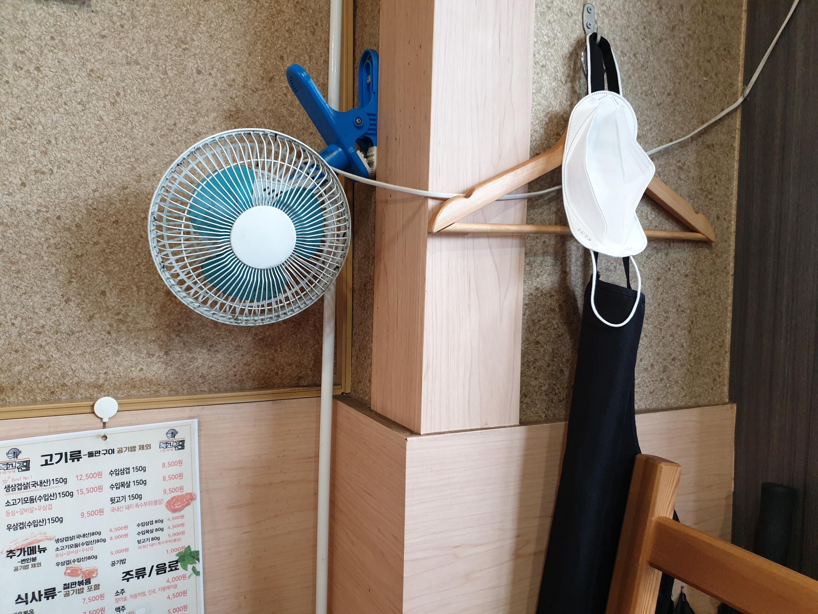 setup of one-person seating in a korean barbeque restaurant in bucheon