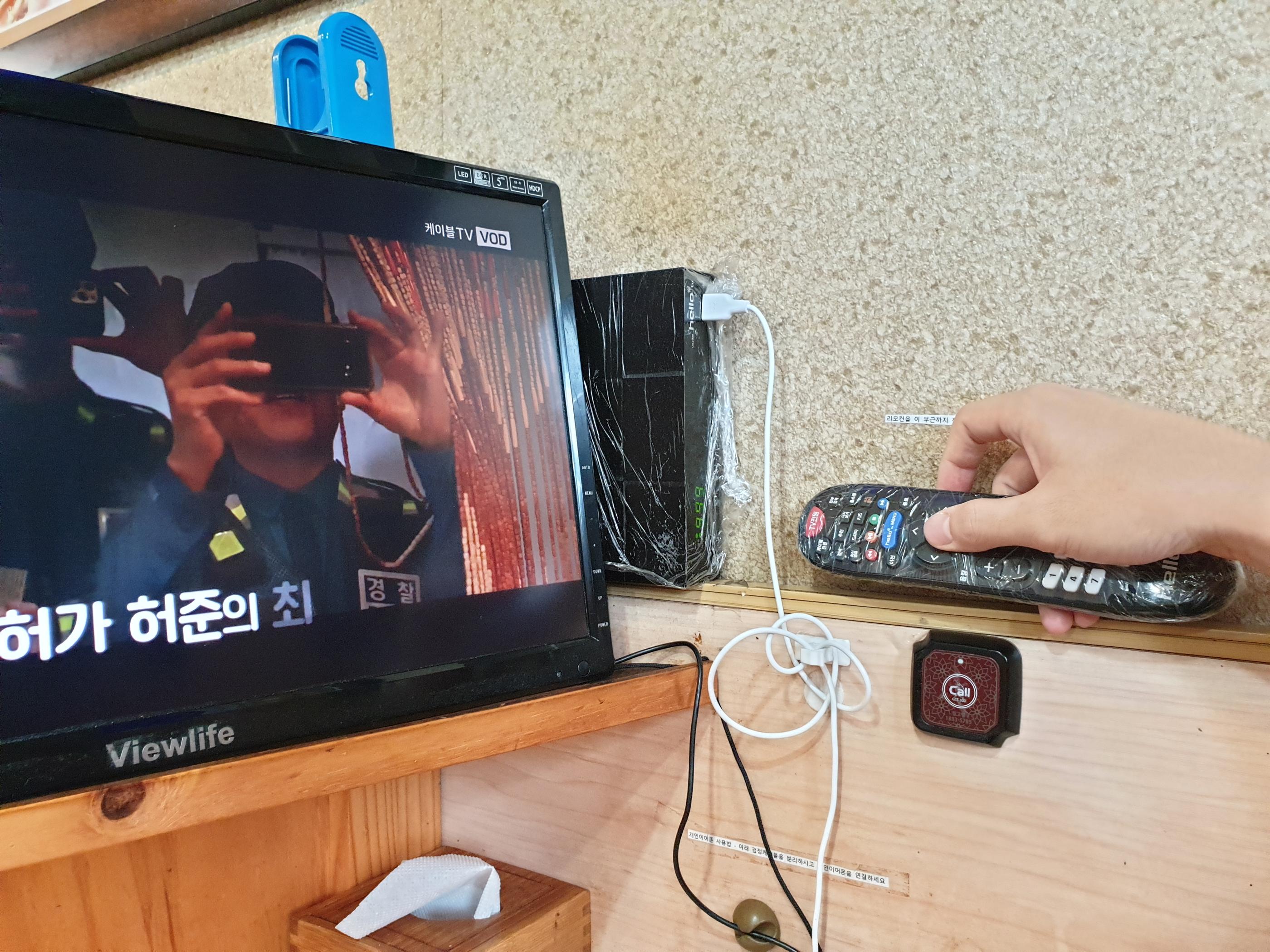 dokgojin, a korean barbeque restaurant to eat alone comes with an individual tv