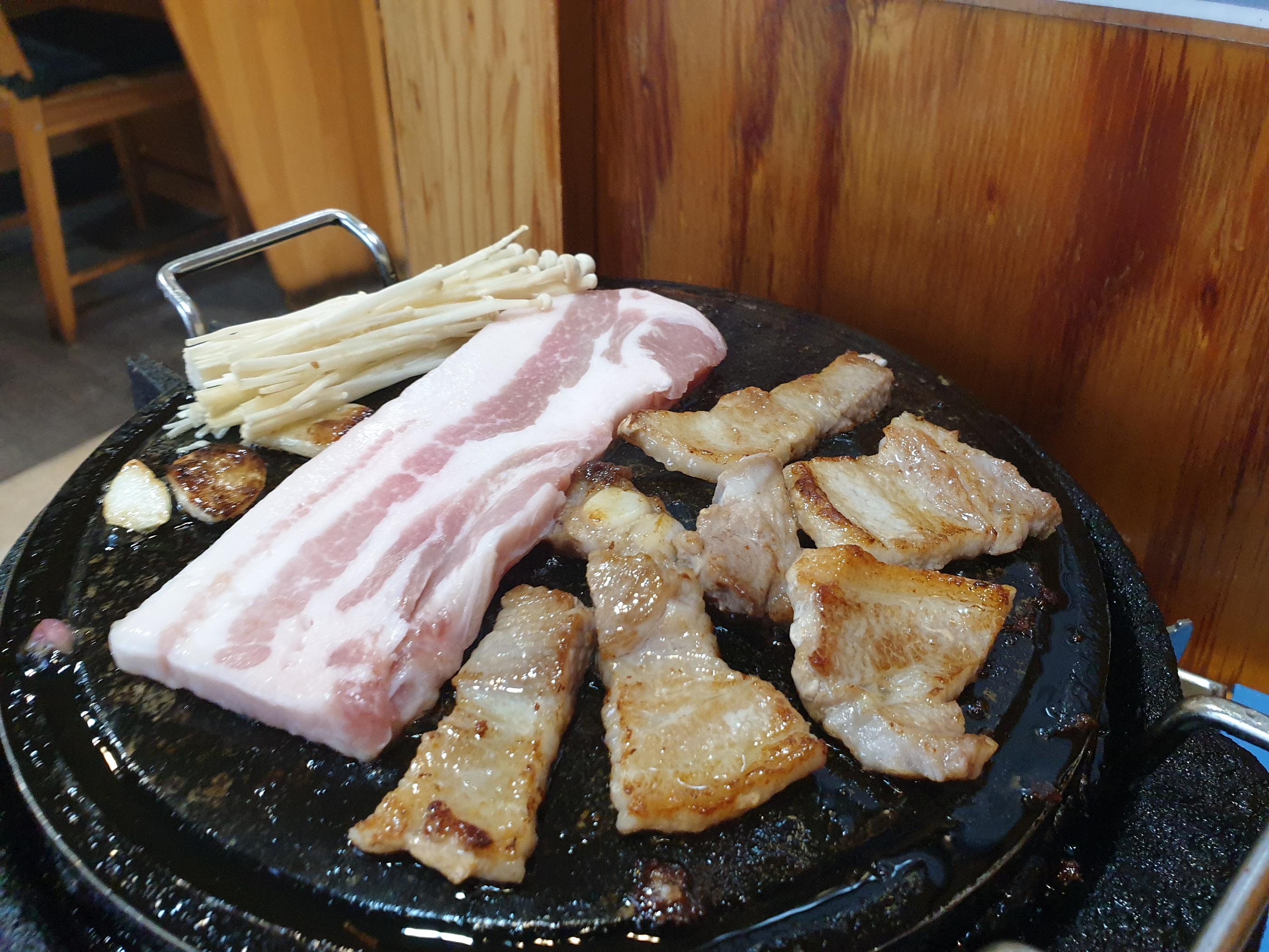 pork belly on the grill, samgyeopsal, korean barbeque