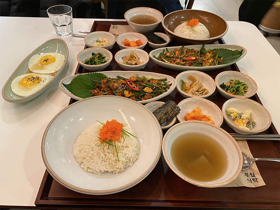a nicely served korean meal with many sides