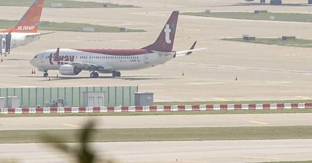 เครื่องบินที่สนามบินในเกาหลีใต้รอรับผู้โดยสารตามมาตรการเข้มงวดในช่วงการระบาดของ COVID-19