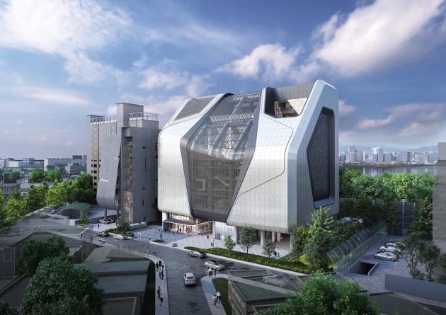 YGエンターテインメントの新社屋外観。近代的なデザインとガラス張り構造が目を引く建物。