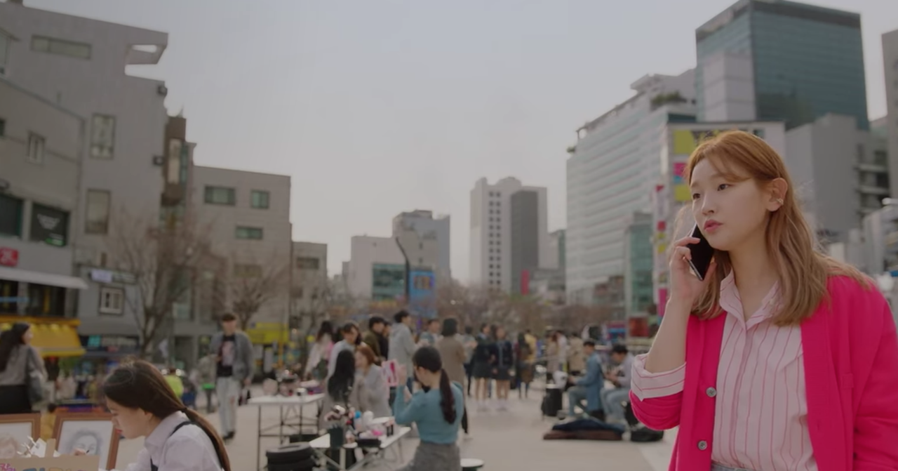 bustling streets of hongdae, park so-dam on the phone, korean drama record of youth