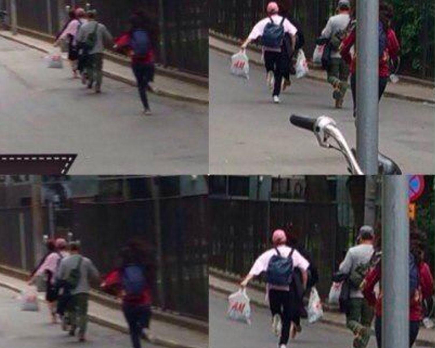 ภาพบรรยากาศกลางแจ้งที่มีผู้คนกำลังเดินในเมือง สะท้อนวิถีชีวิตที่เร่งรีบในเมืองใหญ่