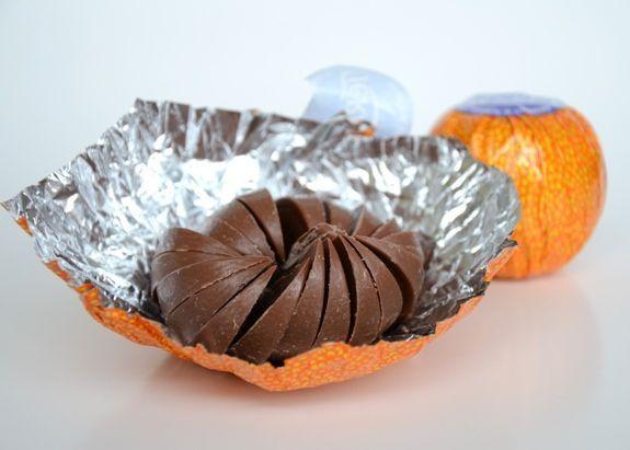 A fully opened Terry's Chocolate Orange showcasing the perfectly divided chocolate slices resembling orange sections.