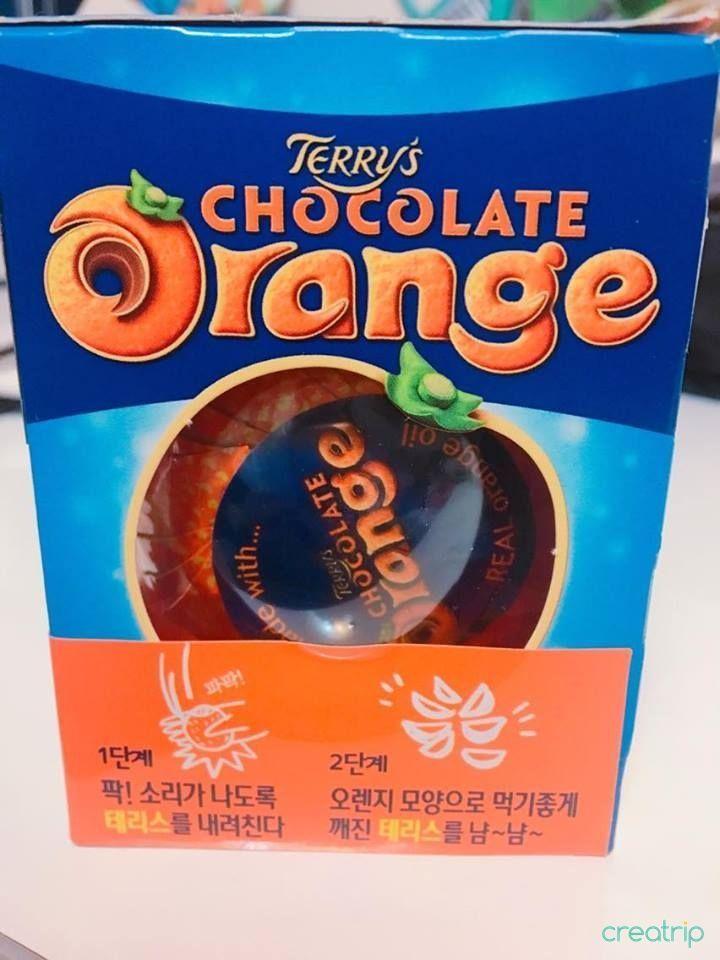 Close up image of the Terry's Chocolate Orange packaging, showcasing detailed Korean instructions and branding.