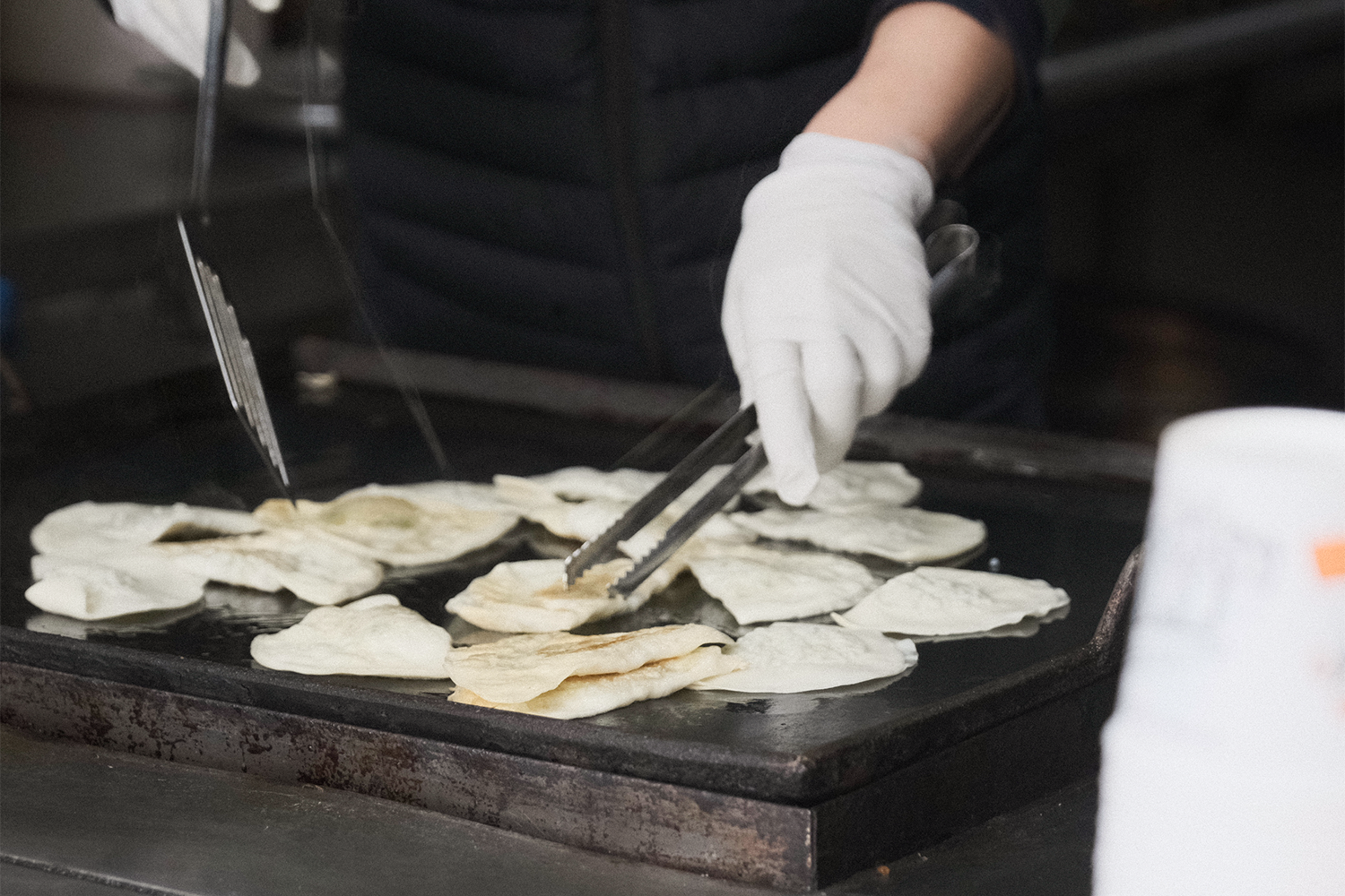 napjak mandu being made at a stall in daegu, korea
