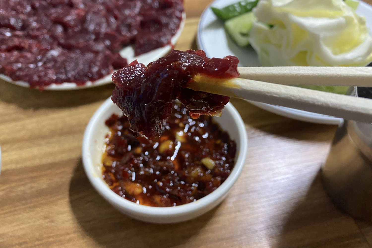 dip the raw beef into their special sauce