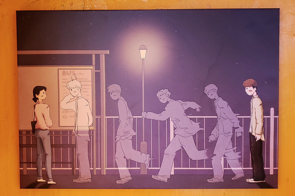 文畫裝咖啡廳牆上的藝術畫，描繪著兩幅骷顱造型的畫作。