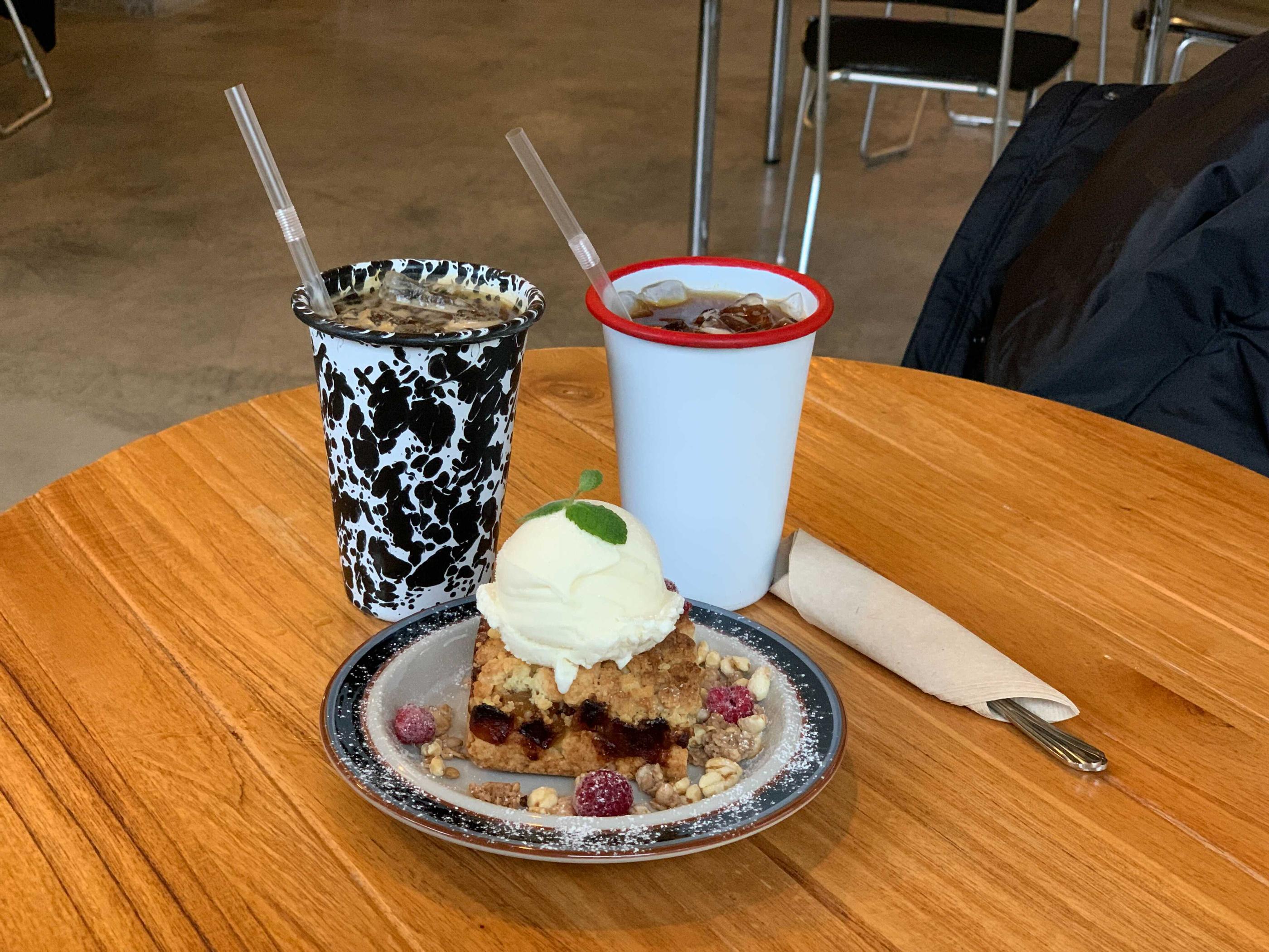 two cups of americano and apple crumble at signifie in gwangju, south korea