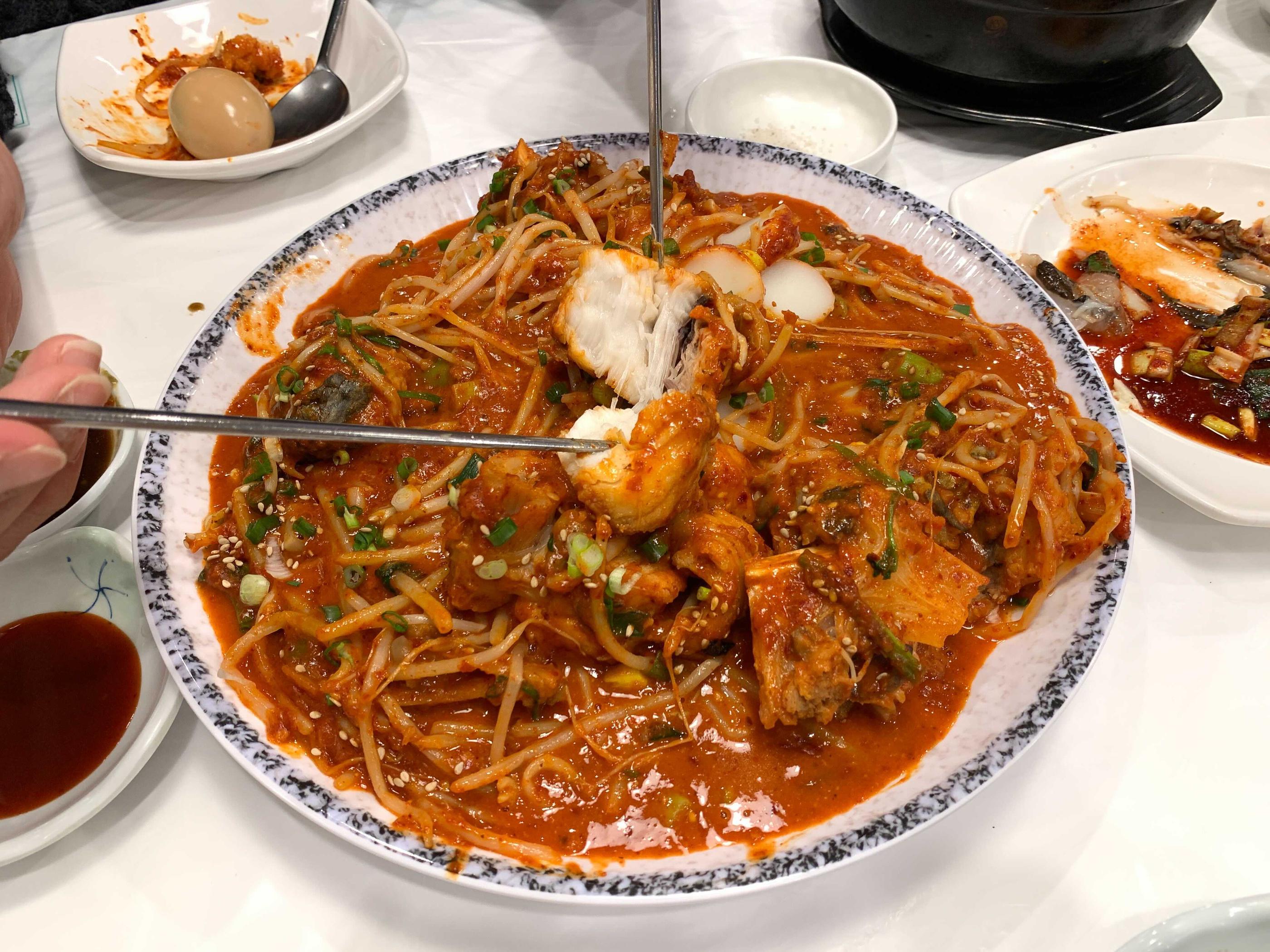 a huge chunk of agu meat (monkfish) at tango agujjim, korea