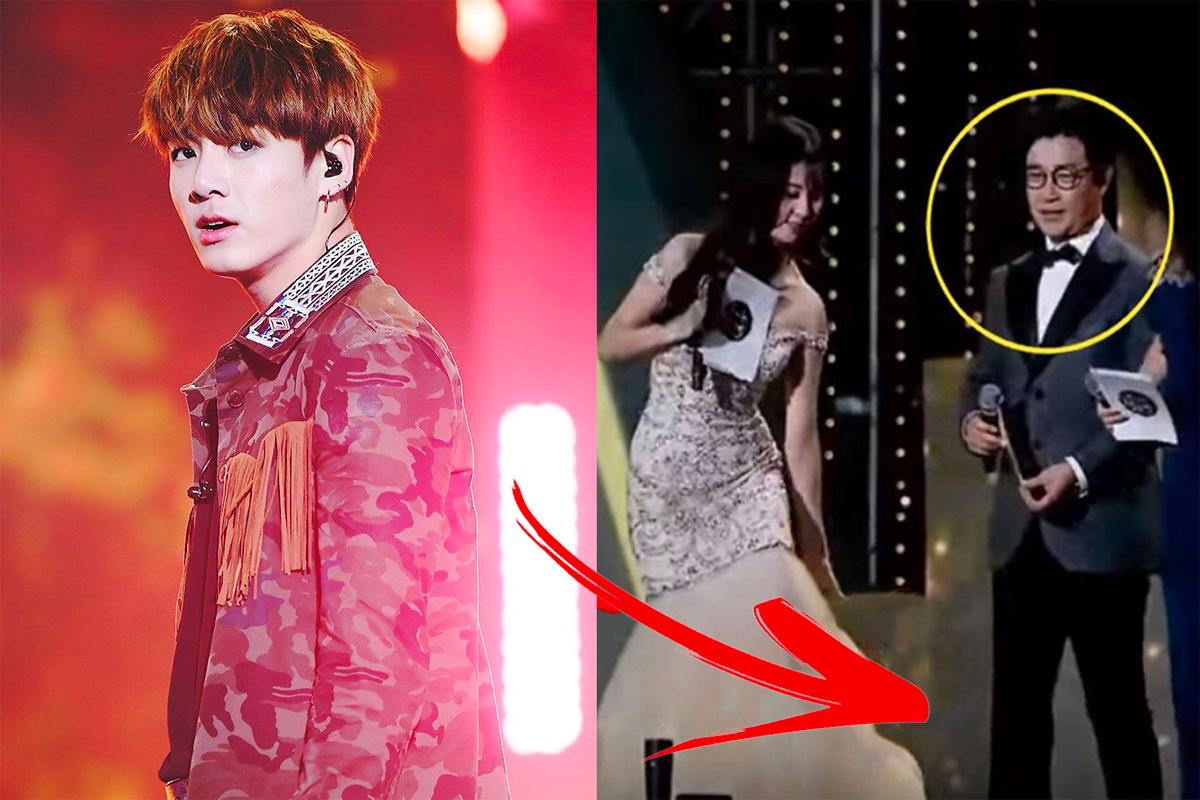 韓國金聖柱在舞台意外中獲得救援的時刻圖像，背景是華麗的表演燈光。