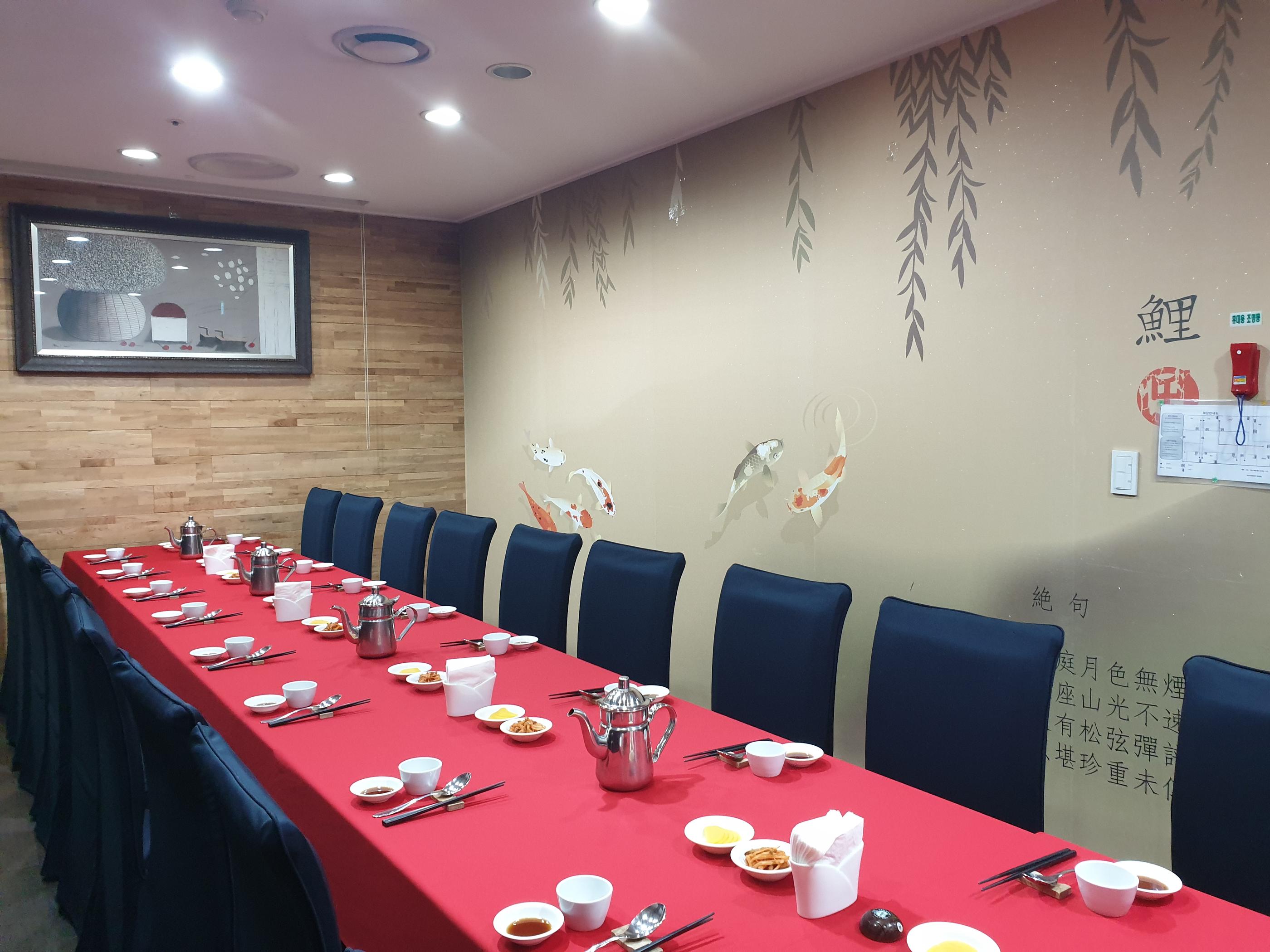 the interior of the room of the restaurant the bts members ate at on jungkook