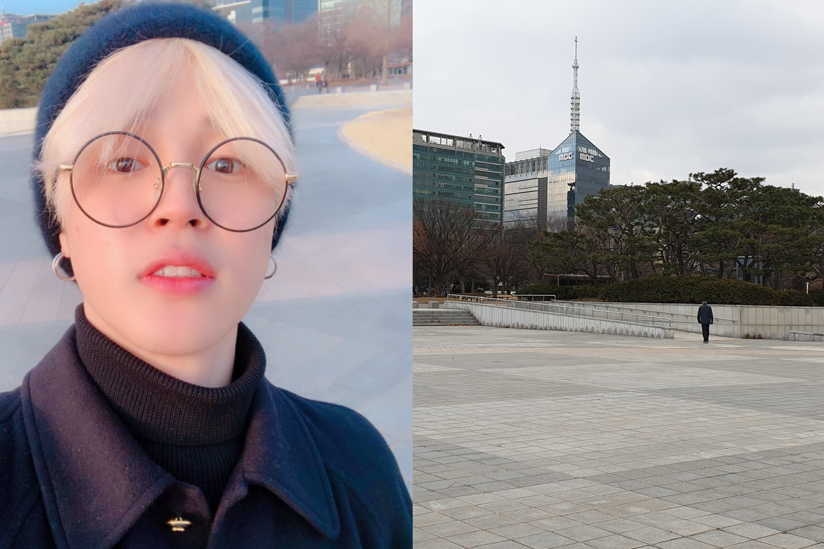 一幅位於韓國京畿道一山湖水公園的照片，包括遊客、樹木和遠處的高樓大廈