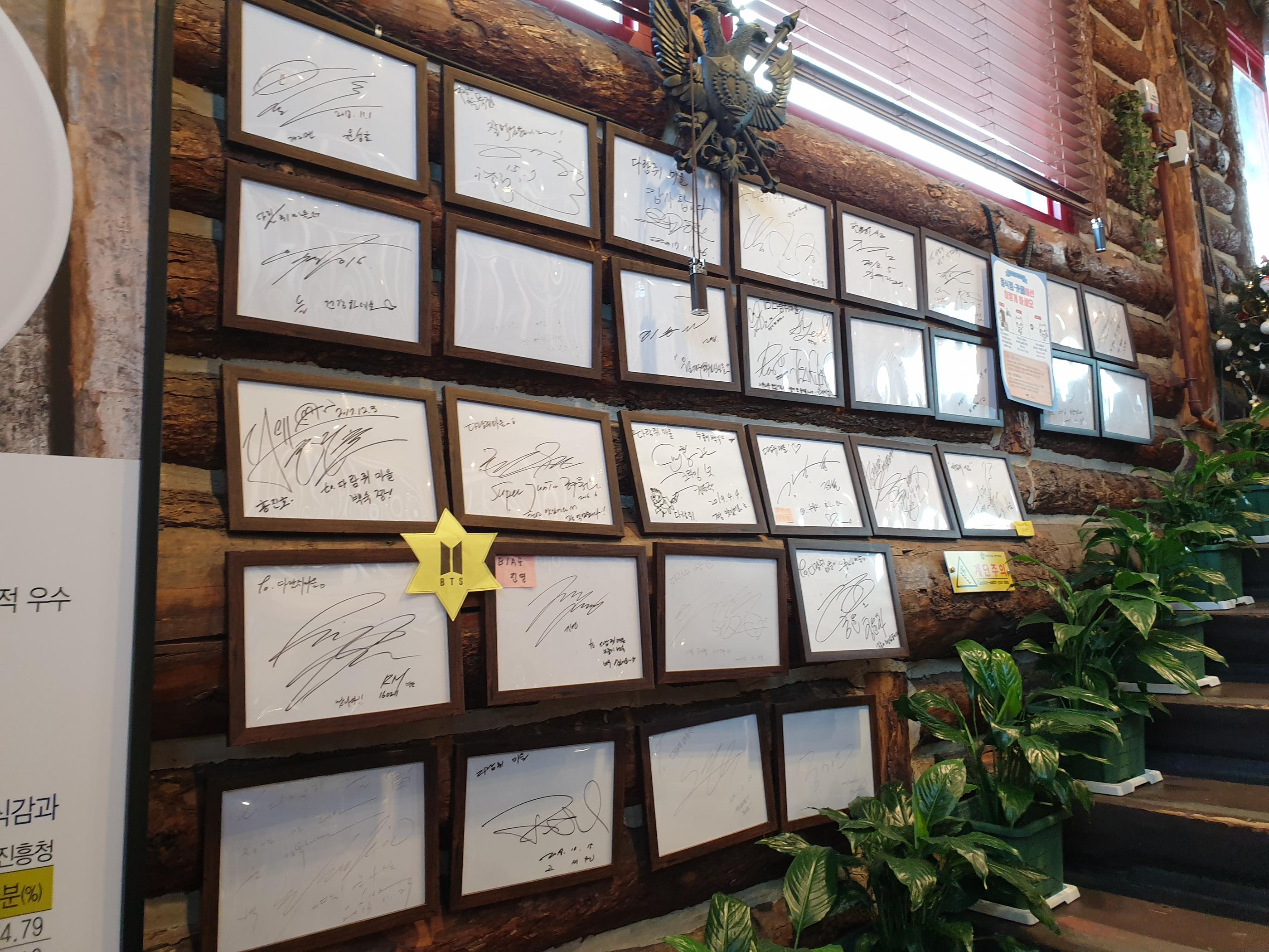 Celebrity autographs displayed at Squirrel Town Mukjip in Ilsan, Korea