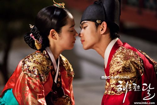 A film poster of a korean historical romance drama where the two leads are about to kiss