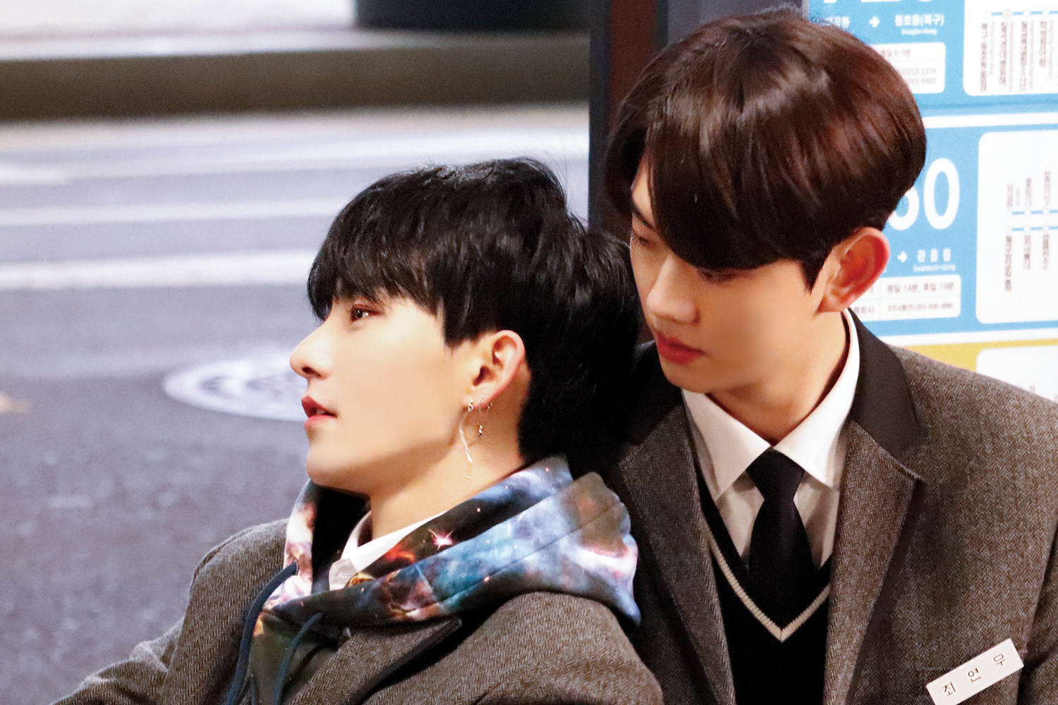 screencap or screenshot of Korean web drama Color Rush, Yeon Woo and Yoo Han leaning against each other at a bus stop