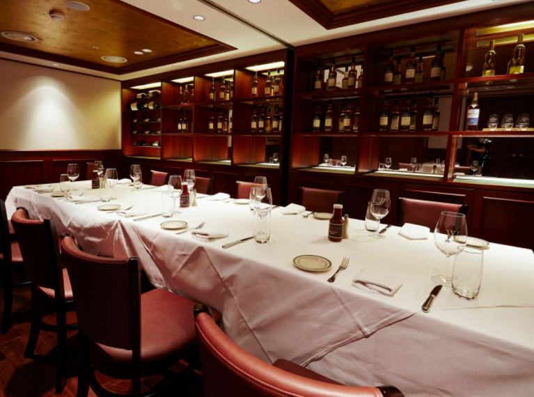 Fancy laid out table in restaurant Wolfgang Steakhouse