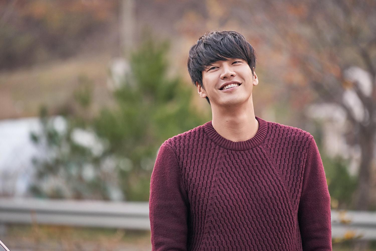 Kim Young-kwang, a South Korean actor and model born in Incheon, wearing a stylish maroon sweater.