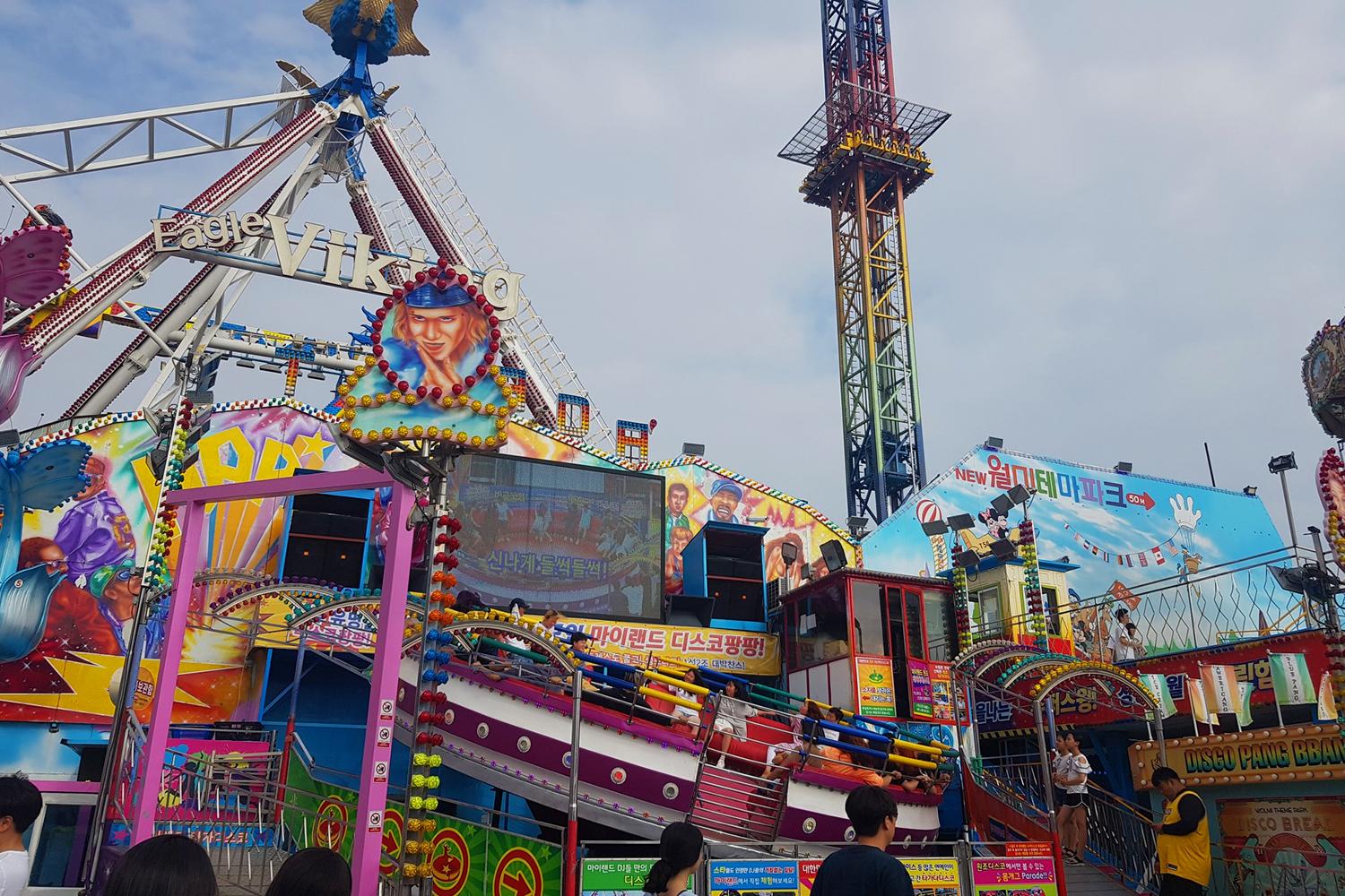 Vibrant amusement park rides and attractions at Wolmido, a popular leisure destination in Incheon.