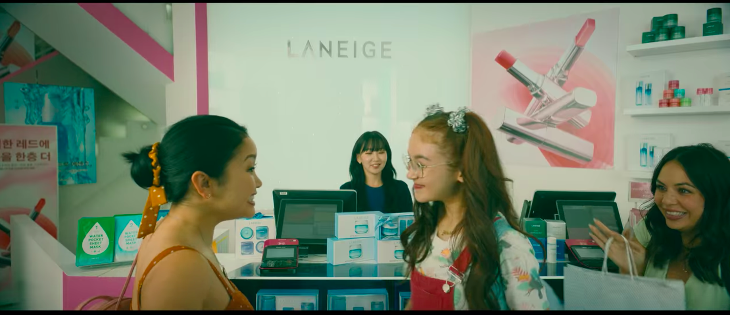 korean make up shop (laneige) in myeongdong korea shown in to all the boys: always and forever song covey sisters at check out counter
