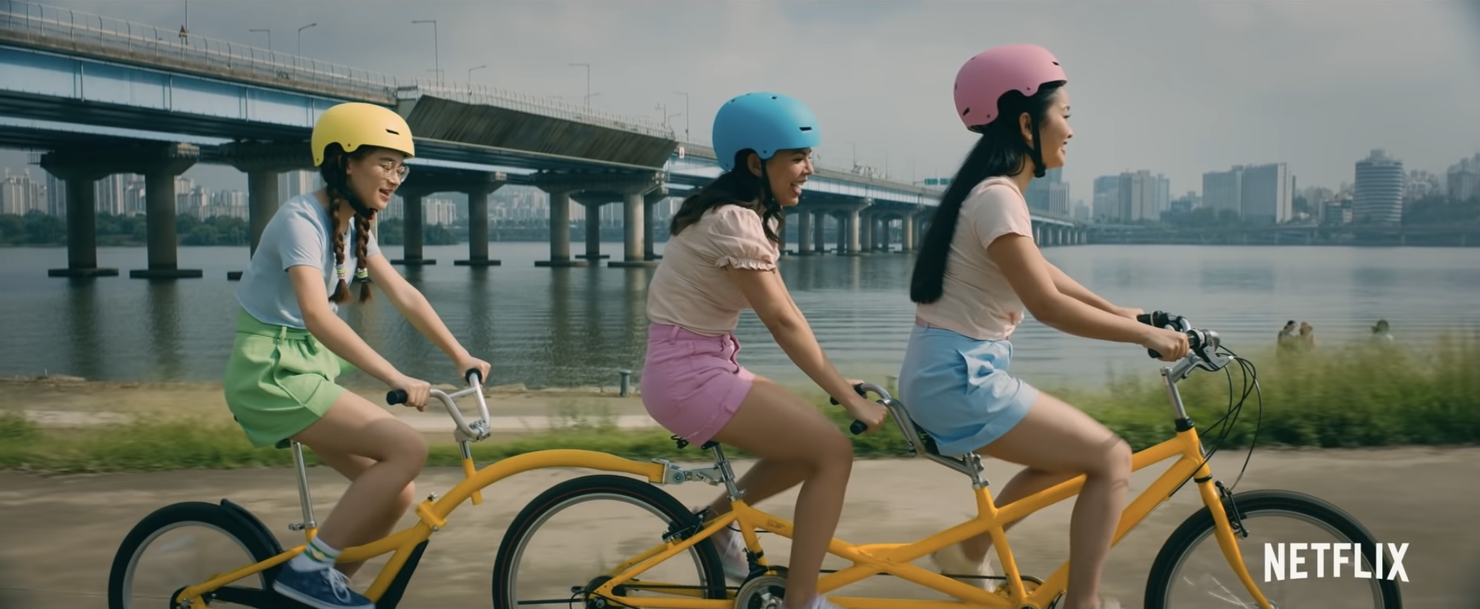to all the boys: always and forever lara jean, margot, and kitty on three person bike and yeouido hangang park