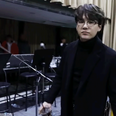 gif of BTS suga dancing and holding a cup of iced coffee