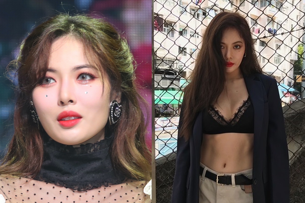 นักร้องเกาหลีสวมเสื้อครอปลายลูกไม้ดำและสูทสีเข้มในงานอีเว้นต์หรือการแสดง