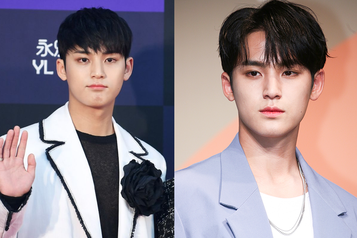 ไอดอลเกาหลีในชุดสูทสีขาวประดับดอกไม้บนเวทีงานประกาศรางวัลหรือการเปิดตัว