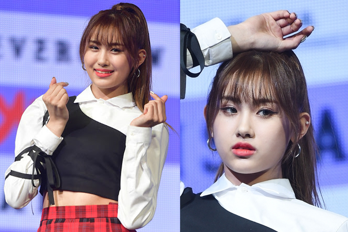 นักร้องหญิงเกาหลีทำท่าแสดงท่าง่าย ๆ ในชุดแฟชั่นเวทีคอนเสิร์ตของวงเคป็อบ