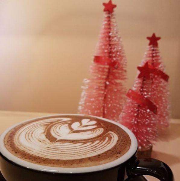 Midnight in Seoul café's special cereal dishes displayed on a table, showcasing a combination of cereals and toppings.