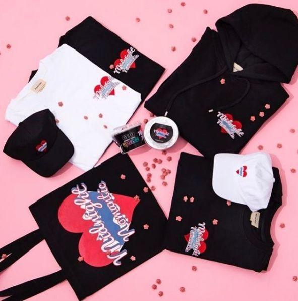 Midnight in Seoul branded merchandise, including apparel and accessories, reflecting its dynamic branding and fashion appeal.