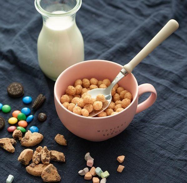 Dog-friendly setting of Midnight in Seoul café, inspired by owner Jo Kwon’s love for pets, offering a unique experience.