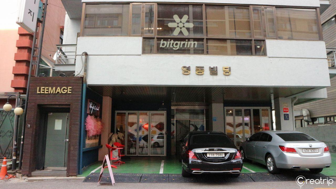 Street view of Midnight in Seoul, a hidden café gem in Gangnam with subtle exterior blending into the neighborhood.