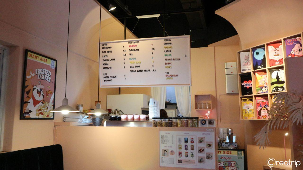 Cozy seating arrangements within Midnight in Seoul, designed to welcome K-pop fans and every visitor warmly.