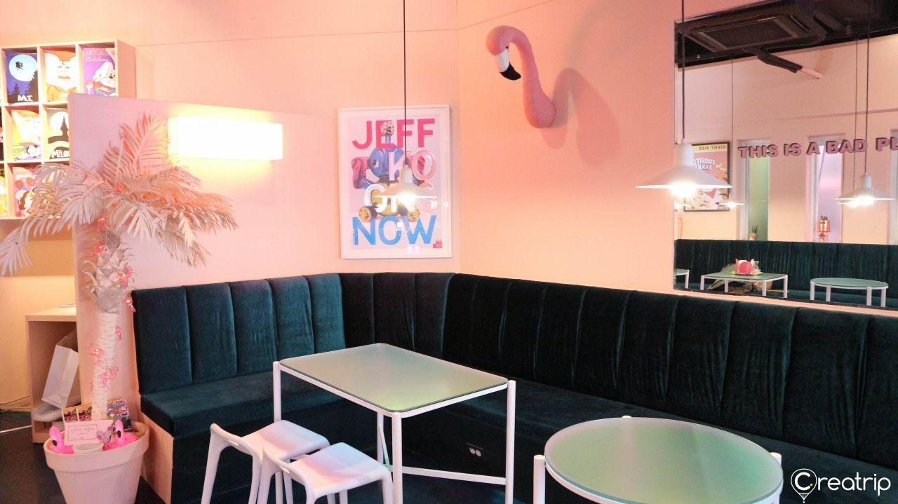 Midnight in Seoul café interior, showcasing the pastel-themed décor that provides an ideal photo backdrop for visitors.